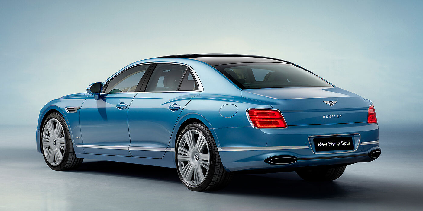 Bentley Tel Aviv New Bentley Flying Spur Azure sedan rear view in Light windsor blue by Mulliner paint with 22 inch Azure wheels and chrome exterior details
