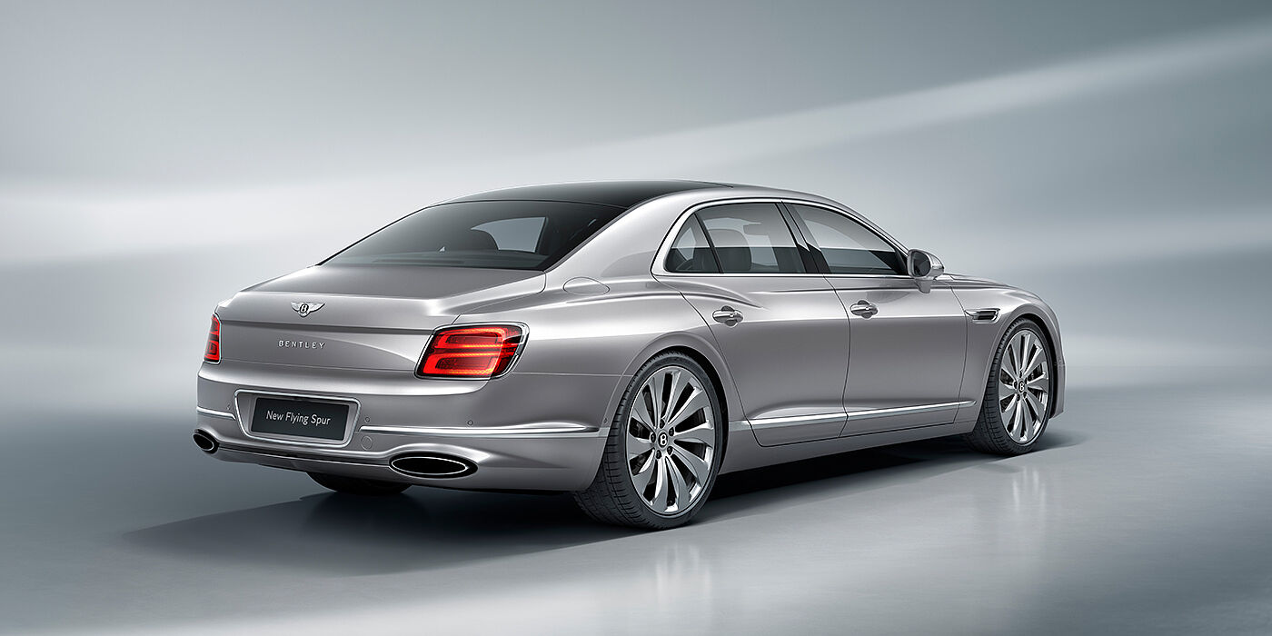 Bentley Tel Aviv New Bentley Flying Spur sedan rear view in Silverlake paint with ten spoke wheels and chrome matrix grille