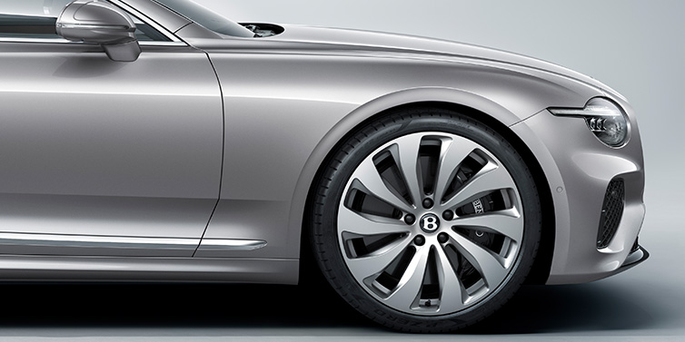 Bentley Tel Aviv New Bentley Continental GT coupe side view featuring bonnet in Silverlake paint and 22 inch ten spoke silver painted and bright machined wheel