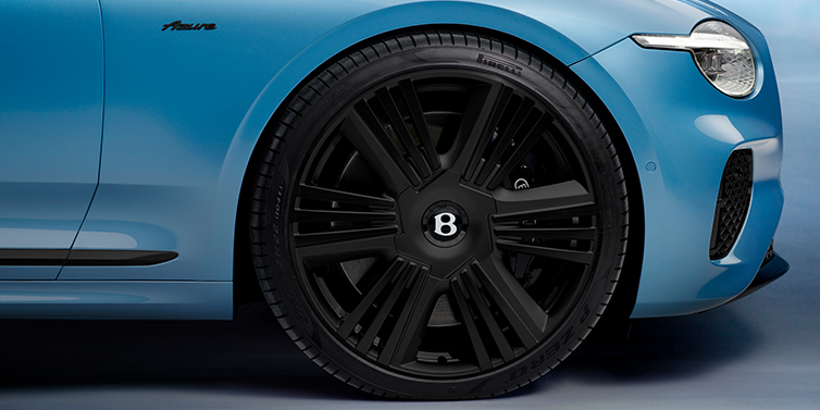 Bentley Tel Aviv New Bentley Continental GTC Azure convertible front wheel detail with 22 inch black ten spoke wheel and dark chrome details against Light Windsor blue paint